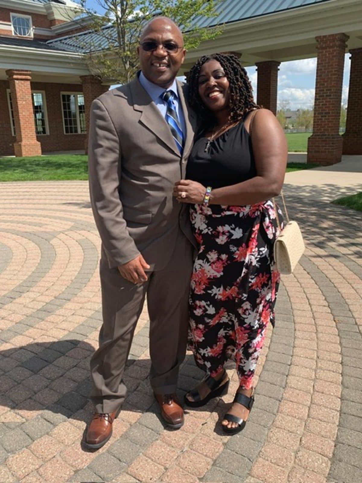 Ohio engineer Eric Nshimiye, who has been charged by federal authorities in connection with alleged genocidal activities in his native Rwanda dating back decades, poses with his wife (Nshimiye Family)