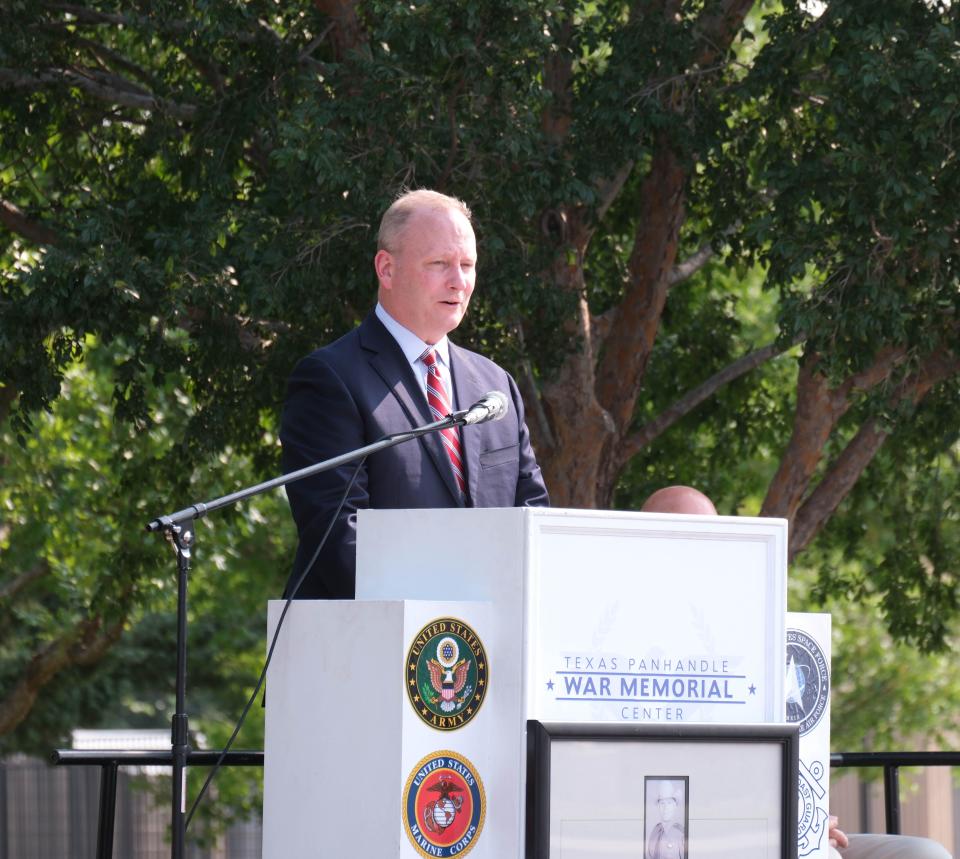 State Rep. Four Price addresses the crowd at a boat dedication ceremony for Trooper Matthew Myrick Friday morning at the Texas Panhandle War Memorial Center in Amarillo.