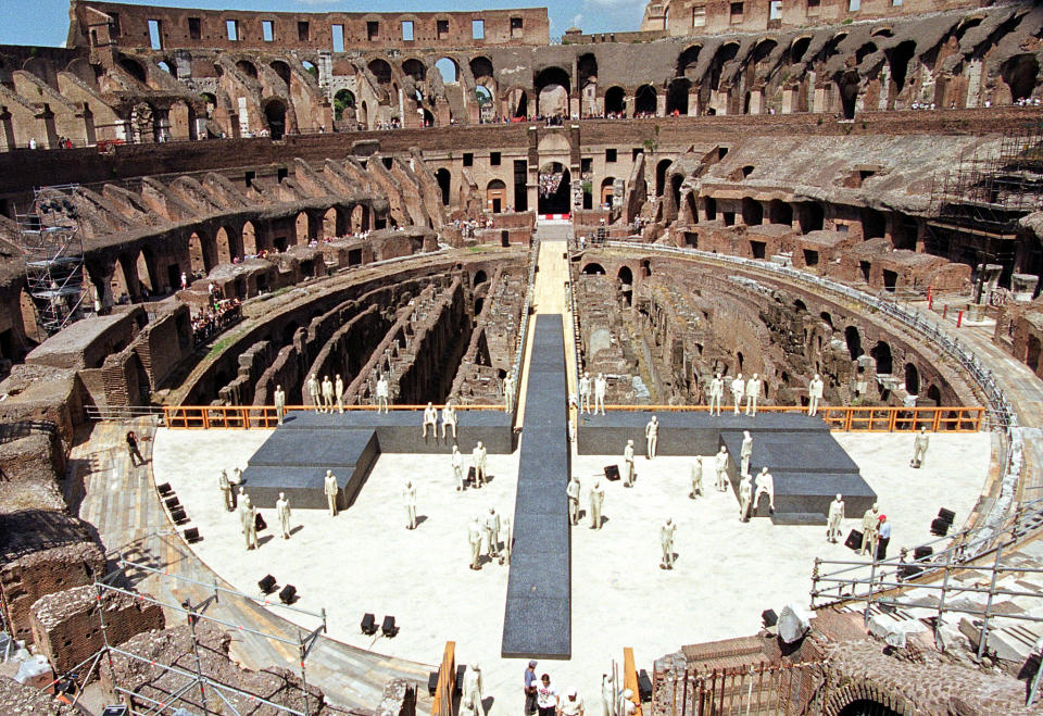 A view of  the Rome's Colosseum's new stage, Monday, July 17, 2000, part of the set up for the Greek National Theater's rendition of Sophocles "Oedipus Rex"  which will be on starting next Wednesday. Giving the arena back its stage after 1500 years capped an eight-year-long restoration of the monument, making now possible to have the same center-stage view of the imposing Colosseum that the gladiators had moments before they met a bloody death or gloried in victory. (AP Photo/Gregorio Borgia)