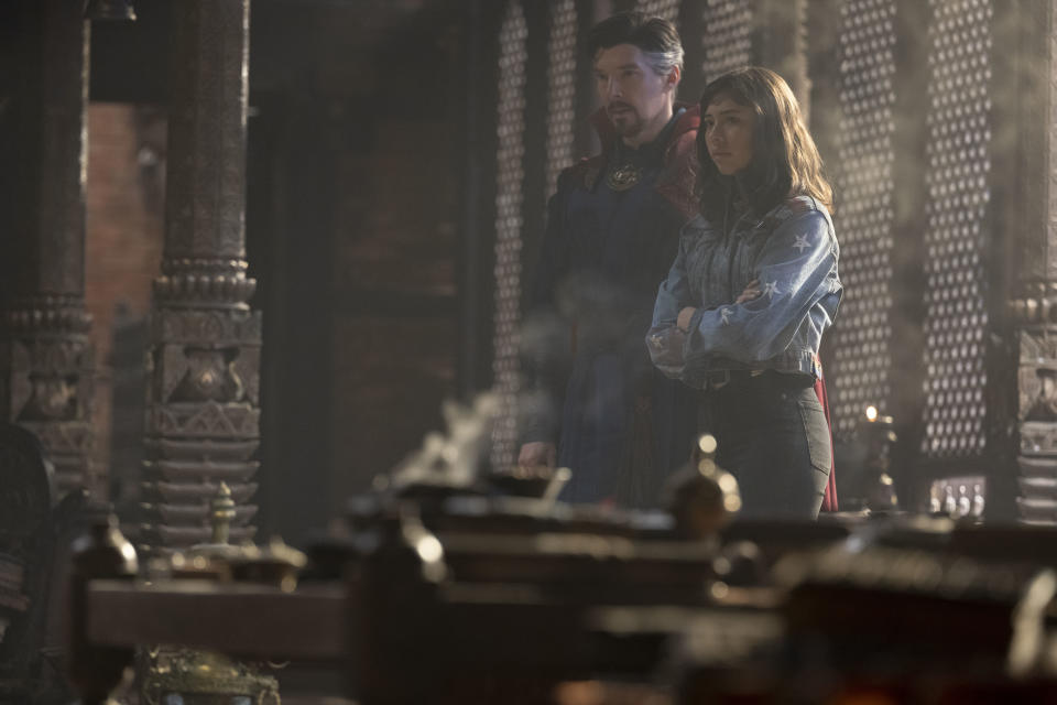 Benedict Cumberbatch as Dr. Stephen Strange and Xochitl Gomez as America Chavez in Marvel Studios' DOCTOR STRANGE IN THE MULTIVERSE OF MADNESS. Photo by Jay Maidment. Â©Marvel Studios 2022. All Rights Reserved.