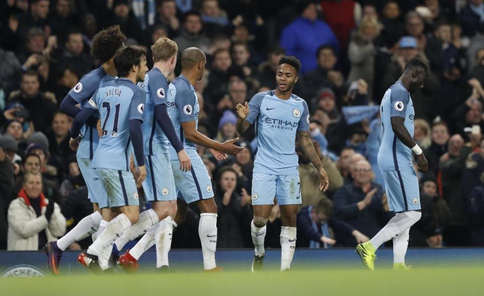 <p>Britain Football Soccer – Manchester City v Arsenal – Premier League – Etihad Stadium – 18/12/16 Manchester City’s Raheem Sterling celebrates scoring their second goal with team mates Action Images via Reuters / Carl Recine Livepic EDITORIAL USE ONLY. No use with unauthorized audio, video, data, fixture lists, club/league logos or “live” services. Online in-match use limited to 45 images, no video emulation. No use in betting, games or single club/league/player publications. Please contact your account representative for further details. </p>