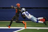 FILE - Cleveland Browns wide receiver Odell Beckham Jr. (13) scores a touchdown after a long run as Dallas Cowboys linebacker Jaylon Smith (54) attempts the stop in the second half of an NFL football game in Arlington, Texas, Sunday, Oct. 4, 2020. Odell Beckham Jr. is being released by the Cleveland Browns, who are cutting ties with the polarizing star wide receiver and have officially ended his drama-filled stay with the team. Beckham’s unceremonious exit — not completely official — came on Friday, Nov. 5, 2021, his 29th birthday. (AP Photo/Michael Ainsworth, File)