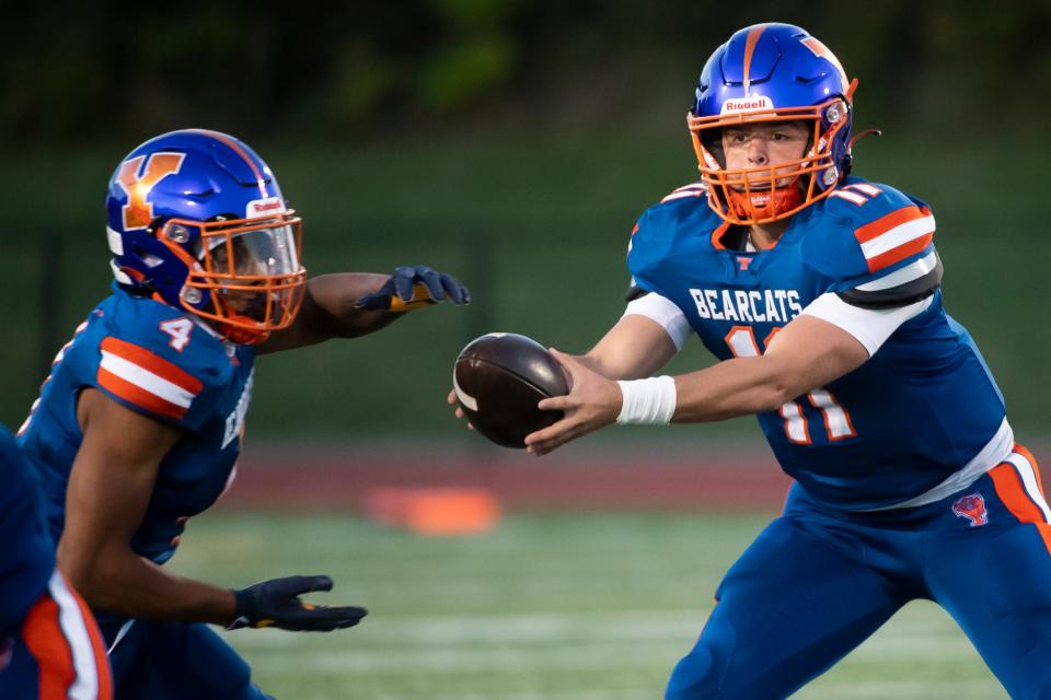 York High quarterback Sam Stoner holds out the handoff for running back Jahiem White during a YAIAA Division I football game against Red Lion at Small Athletic Field on Friday, September 23, 2022. 