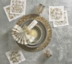 <p>This beautiful tablescape from tastemaker and tableware designer <a href="https://kimseybert.com/" rel="nofollow noopener" target="_blank" data-ylk="slk:Kim Seybert;elm:context_link;itc:0;sec:content-canvas" class="link ">Kim Seybert</a> is perfect for a luxe NYE at home. Whether you're used to spending your December 31 at a lavish cocktail party or an idyllic ski chalet on another continent, you can still ring in the New Year in style.</p><p>"Setting a table for New Year's is the perfect time to embrace sparkle and shine," Seybert says. "I love my <a href="https://kimseybert.com/collections/abstract/" rel="nofollow noopener" target="_blank" data-ylk="slk:Abstract collection;elm:context_link;itc:0;sec:content-canvas" class="link ">Abstract collection</a> and how it adds glow to any table to create a festive atmosphere for family and friends.” </p><p> This tablescape is inspired by twinkling lights for a dreamy vignette, and we especially love these <a href="https://kimseybert.com/products/otomi-cocktail-napkins-set-of-6-in-gift-box" rel="nofollow noopener" target="_blank" data-ylk="slk:linen cocktail napkins;elm:context_link;itc:0;sec:content-canvas" class="link ">linen cocktail napkins</a> that were inspired by a Mexican tapestry. </p>