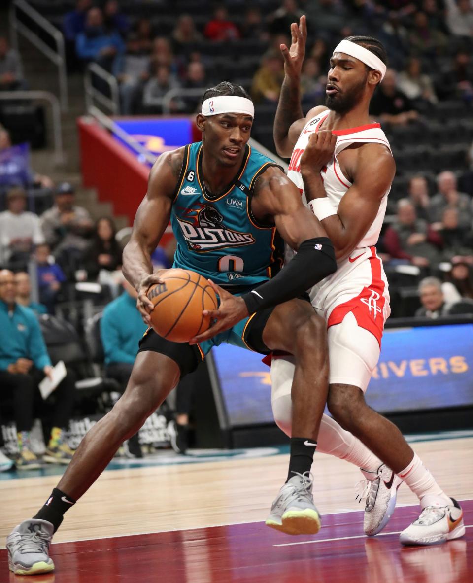 Detroit Pistons center Jalen Duren drives against Houston Rockets forward Tari Eason during the first quarter Saturday, Jan. 28, 2023 at Little Caesars Arena.