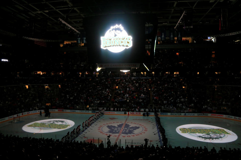 The logo of the Humboldt Broncos is displayed on the ice and scoreboard during a moment silence before a game between the Montreal Canadiens and Toronto Maple Leafs on Saturday. (Photo: USA Today Sports / Reuters)