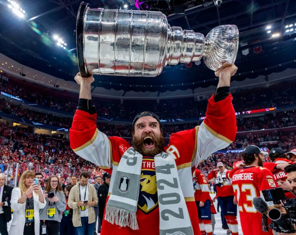 Sunrise, Florida, June 24, 2024 - Florida Panthers defenseman Aaron Ekblad (5) is elated as he lifts the Stanley Cup during the victory celebration immediately following Game 7 of the Stanley Cup Final