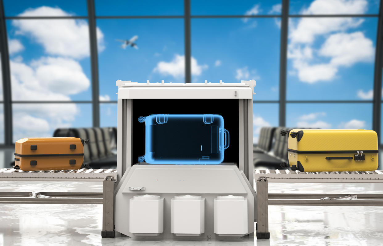 3d rendering luggage scanner in airport laptop