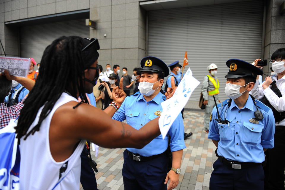 TOKYO, JAPAN - JUNE 6 : People attend a demonstration in Tokyo, Japan against racism and police violence in echo to the killing of a black man, George Floyd in the US at the hands of a white police office, on June 6, 2020. (Photo by David Mareuil/Anadolu Agency via Getty Images)