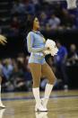 UCLA cheerleaders perform against the Florida during the first half in a regional semifinal game at the NCAA college basketball tournament, Thursday, March 27, 2014, in Memphis, Tenn. (AP Photo/John Bazemore)