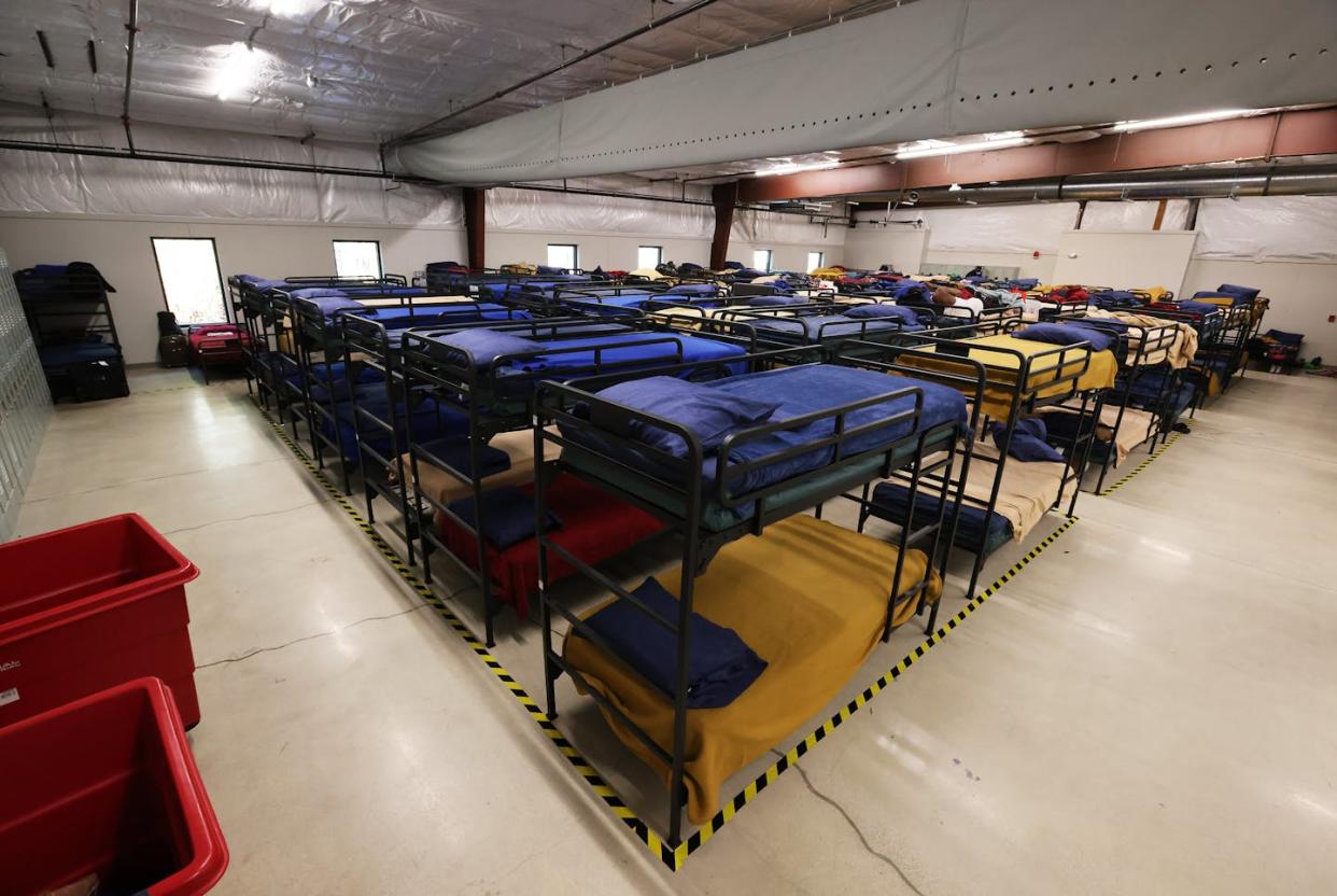 The men's dormitory at a new center for asylum-seekers in Portland, Maine. <a href="https://www.gettyimages.com/detail/news-photo/the-mens-dormitory-within-the-new-20-000-square-foot-news-photo/1966051345" rel="nofollow noopener" target="_blank" data-ylk="slk:Ben McCanna/Portland Press Herald via Getty Images;elm:context_link;itc:0;sec:content-canvas" class="link ">Ben McCanna/Portland Press Herald via Getty Images</a>