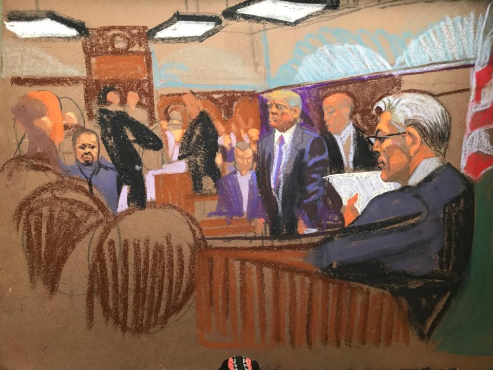 A court sketch of Donald Trump standing among other people in the courtroom.