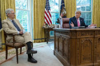 FILE - Senate Majority Leader Mitch McConnell of Ky., listens as President Donald Trump speaks during a meeting in the Oval Office of the White House, July 20, 2020, in Washington. The end of Roe v. Wade started in the Senate. The Senate Republican partnership with Trump to confirm conservative justices paved the way for the Supreme Court’s landmark ruling on abortion rights. (AP Photo/Evan Vucci, File)