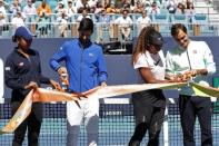 Mar 20, 2019; Miami Gardens, FL, USA; (L-R) Naomi Osaka of Japan, Novak Djokovic of Serbia, Serena Williams of the United States, and Roger Federer of Switzerland participate in a ribbon cutting ceremony on new stadium court at Hard Rock Stadium prior to play in the first round of the Miami Open at Miami Open Tennis Complex. Geoff Burke