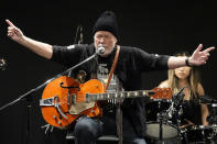 Canadian rock legend Randy Bachman sings as he plays with his reunited Gretsch guitar during the Lost and Found Guitar Exchange Ceremony Friday, July 1, 2022, at Canadian Embassy in Tokyo. 45 years later, the guitar founds its way to Japan in the hands Bachman’s long-held dream came true Friday when he was reunited in Tokyo with a beloved guitar nearly a half-century after it was stolen from a Toronto hotel. Bachman, 78, a former member of The Guess Who, received the guitar from a Japanese musician who had bought it at a Tokyo store in 2014 without knowing its history. (AP Photo/Eugene Hoshiko)