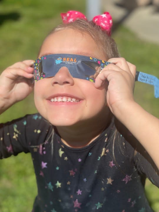 Look at the joy in that smile! Photo from Angelique Thames, taken at the Chesapeake Public Library Solar Eclipse event on April 8, 2024.