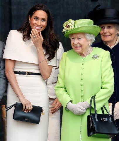 <p>Max Mumby/Indigo/Getty Images</p> Meghan Markle with the late Queen Elizabeth on their first royal engagement together on June 14, 2018