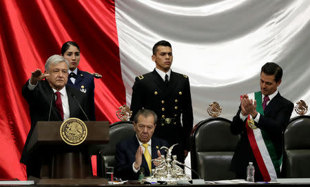 Mexico's new President Andres Manuel Lopez Obrador takes an oath at the Congress in Mexico City, Mexico December 1, 2018. REUTERS/Henry Romero