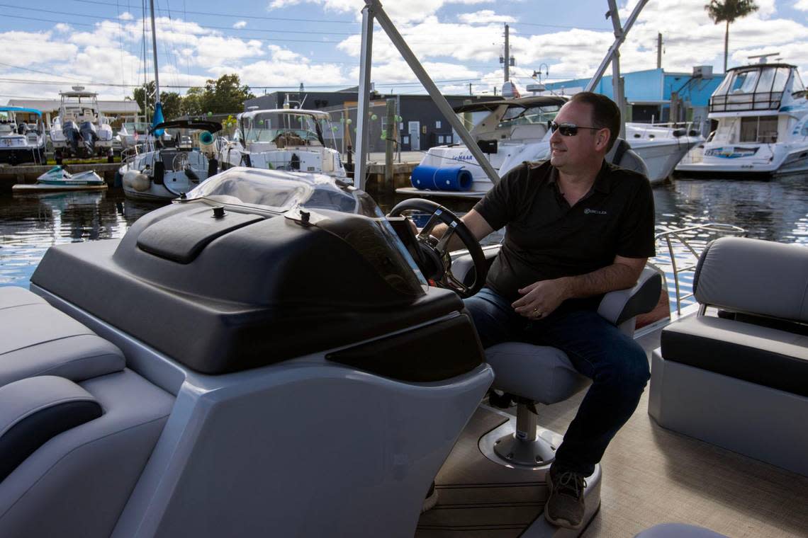 Hercules Electric Marine Founder and CEO James Breyer cruises on the Miami River during a private test trial for the Miami International Boat Show in Miami, Florida, on Tuesday, Feb. 14, 2023.
