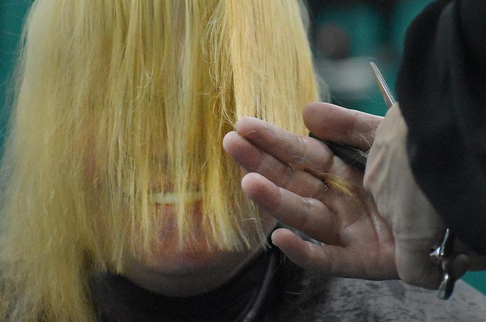 Angelina Magrath has her hair done at the Greater Fall River YMCA April 27.