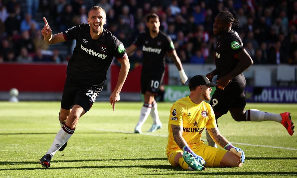 <span>West Ham United's Tomas Soucek wheels away to celebrate after scoring the equaliser.</span><span>Photograph: Henry Nicholls/AFP/Getty Images</span>