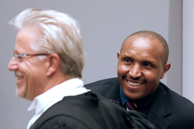 Ntaganda and his lawyer Stephane Bourgon (L) have rejected the former commander's nickname of 'Terminator'