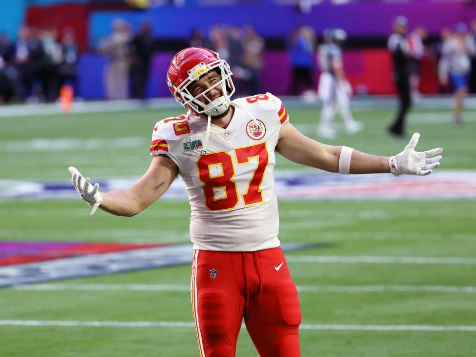 Kansas City Chiefs tight end Travis Kelce smiles and shrugs during Super Bowl LVII.