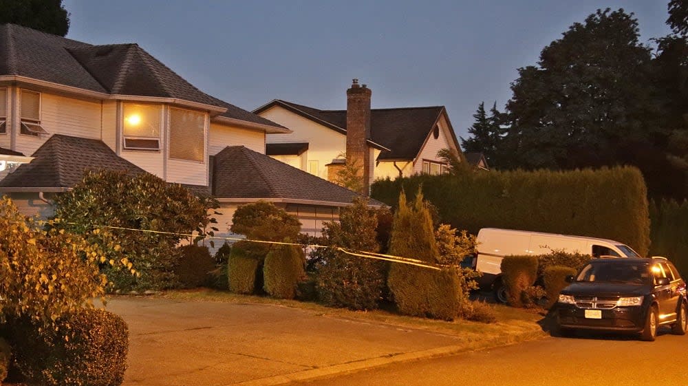 Police tape marks the home where Kamaljit Sandhu, 45, was found dying on July 28, 2022. Police say her husband, Inderjit Singh Sandhu, has pleaded guilty to 2nd-degree murder. (Shane MacKichan - image credit)