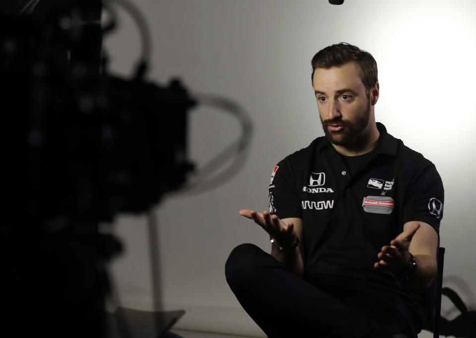 IndyCar Series driver James Hinchcliffe responds to a question during IndyCar Series annual media day Wednesday, Jan. 18, 2017, in Indianapolis. (AP Photo/Darron Cummings)
