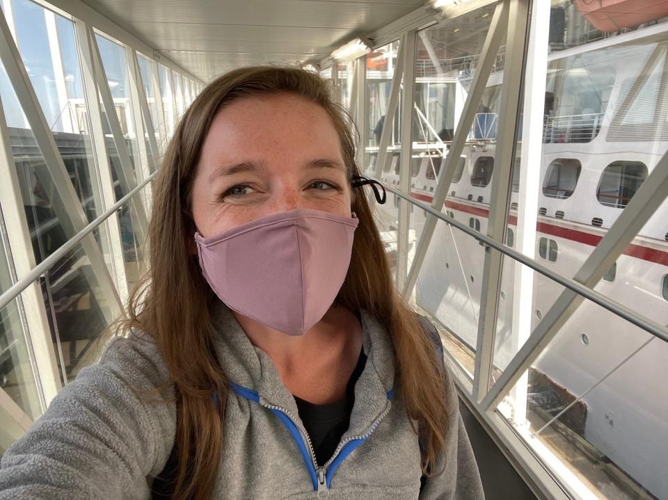 A selfie boarding the cruise ship and wearing a mask.