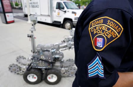 Cleveland police bomb squad technician Sgt. Tim Maffo-Judd demonstrates a Remotec F5A explosive ordnance device robot during a demonstration of police capabilities near the site of the Republican National Convention in Cleveland, Ohio, U.S. July 14, 2016. REUTERS/Rick Wilking