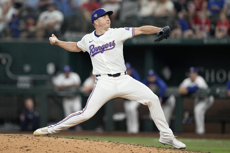Texas Rangers relief pitcher Josh Sborz throws to the Seattle Mariners in the ninth inning of a baseball game in Arlington, Texas, Thursday, April 25, 2024. (AP Photo/Tony Gutierrez)