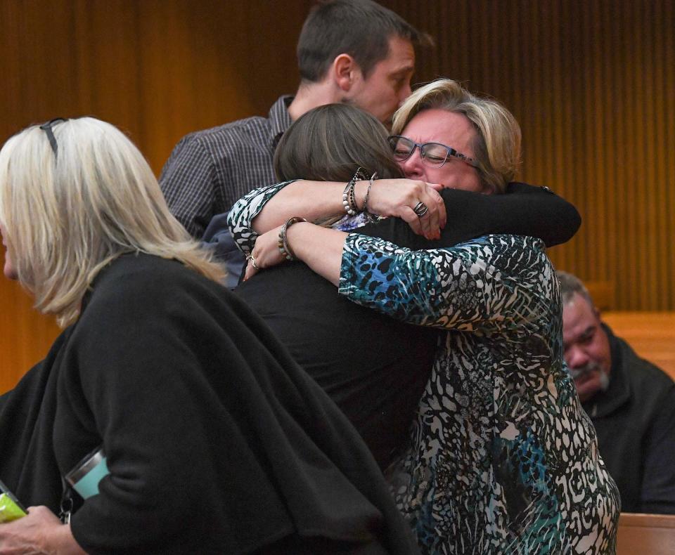 Townville Elementary and families affected by the shooting from 2016 hug after Jesse Osborne was sentenced by Judge Lawton McIntosh for life at the sentence-related hearing at the Anderson County Courthouse Thursday, November 14, 2019. 