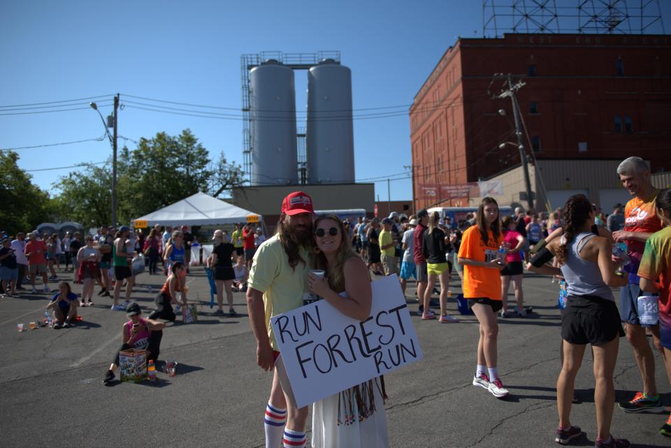 Gardner A. Walker III and his wife Sarah Walker dressed up as Forrest Gump and Jenny Curran from the movie Forrest Gump for this year's Boilermaker Road Race.