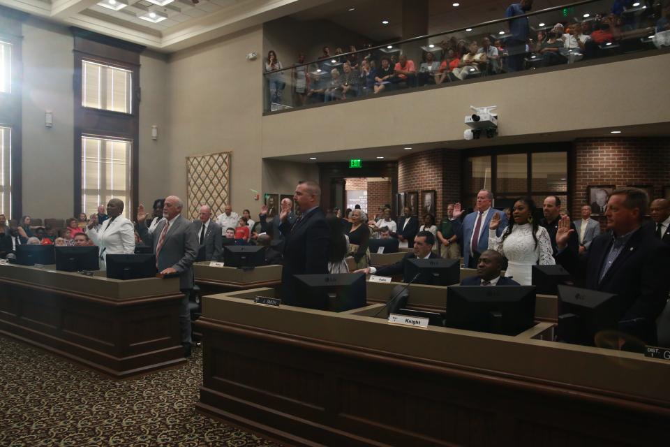 Re-elected county commissioners agreed to be sworn in en-masse by Mayor Jim Durrett during a ceremony at the Montgomery County Courts Complex on Wednesday, August 30, 2022.