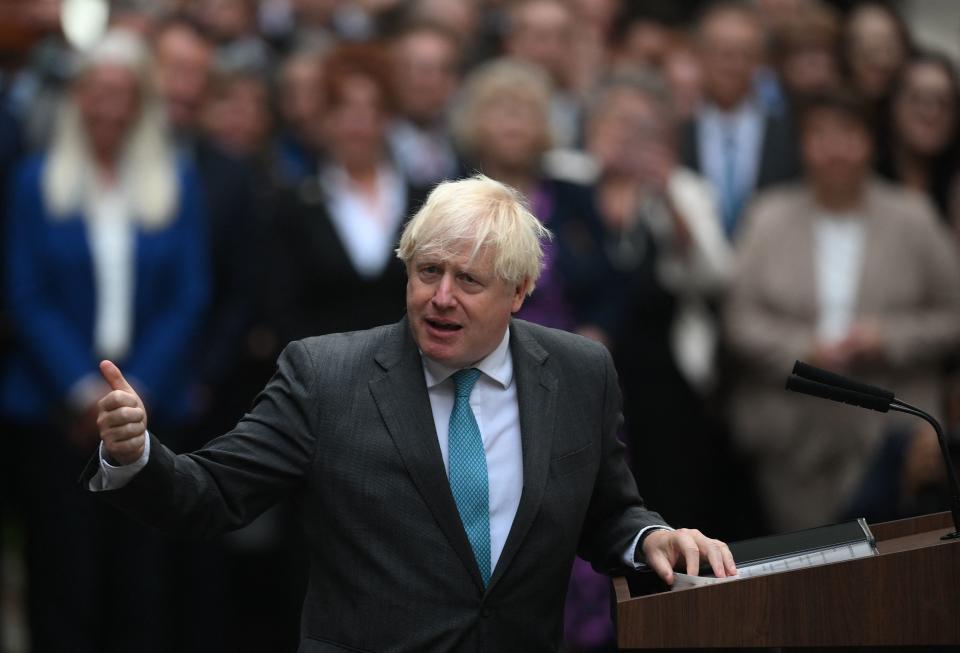 TOPSHOT - Britain's outgoing Prime Minister Boris Johnson delivers his final speech outside 10 Downing Street in central London on September 6, 2022, before heading to Balmoral to tender his resignation. - British Prime Minister Boris Johnson formally tenders his resignation to Queen Elizabeth II on Tuesday, handing over power to Liz Truss after his momentous tenure dominated by Brexit and Covid was cut short by scandal. (Photo by Daniel LEAL / AFP) (Photo by DANIEL LEAL/AFP via Getty Images)