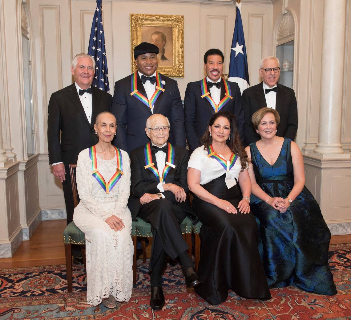 Front row from left, 2017 Kennedy Center Honorees Carmen de Lavallade, Norman Lear, Gloria Estefan and Kennedy Center President Deborah F. Rutter, back row from left, Secretary of State Rex Tillerson, 2017 Kennedy Center Honorees LL Cool J, Lionel Richie, and Kennedy Center Chairman David M. Rubenstein are photographed following the State Department dinner for the Kennedy Center Honors, Saturday, Dec. 2, 2017, in Washington.
