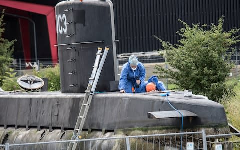 Police technicians on board the home-made submarine  - Credit: Mogens Flindt/Ritzau Foto, File via AP