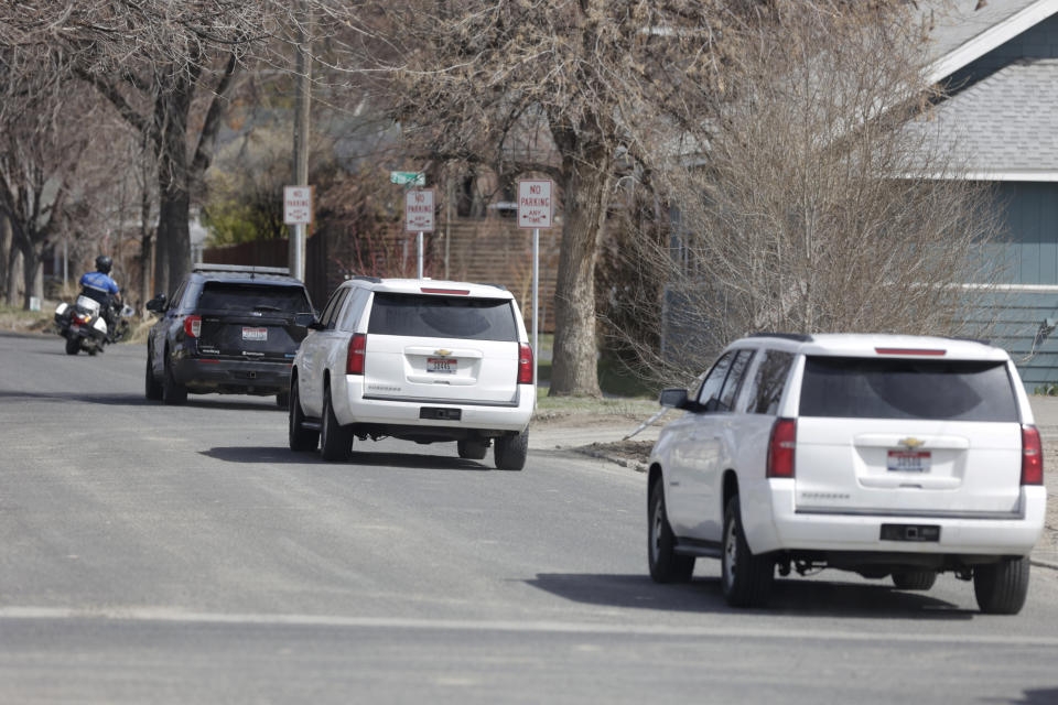 The two suspects in an attack on corrections officers at a Boise, Idaho, hospital are driven from the Twin Falls Court House under heavy police protection after appearing before a judge, Friday March 22, 2024, in Twin Falls, Idaho. (AP Photo/Kyle Green)