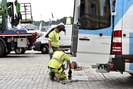 Security measures are taken up near Presidential palace ahead of U.S. President Donald Trump and Russian President Vladimir Putin's summit in Helsinki, Finland July 12, 2018. Lehtikuva/Emmi Korhonen/via REUTERS ATTENTION EDITORS - THIS IMAGE WAS PROVIDED BY A THIRD PARTY. NO THIRD PARTY SALES. NOT FOR USE BY REUTERS THIRD PARTY DISTRIBUTORS. FINLAND OUT. NO COMMERCIAL OR EDITORIAL SALES IN FINLAND.