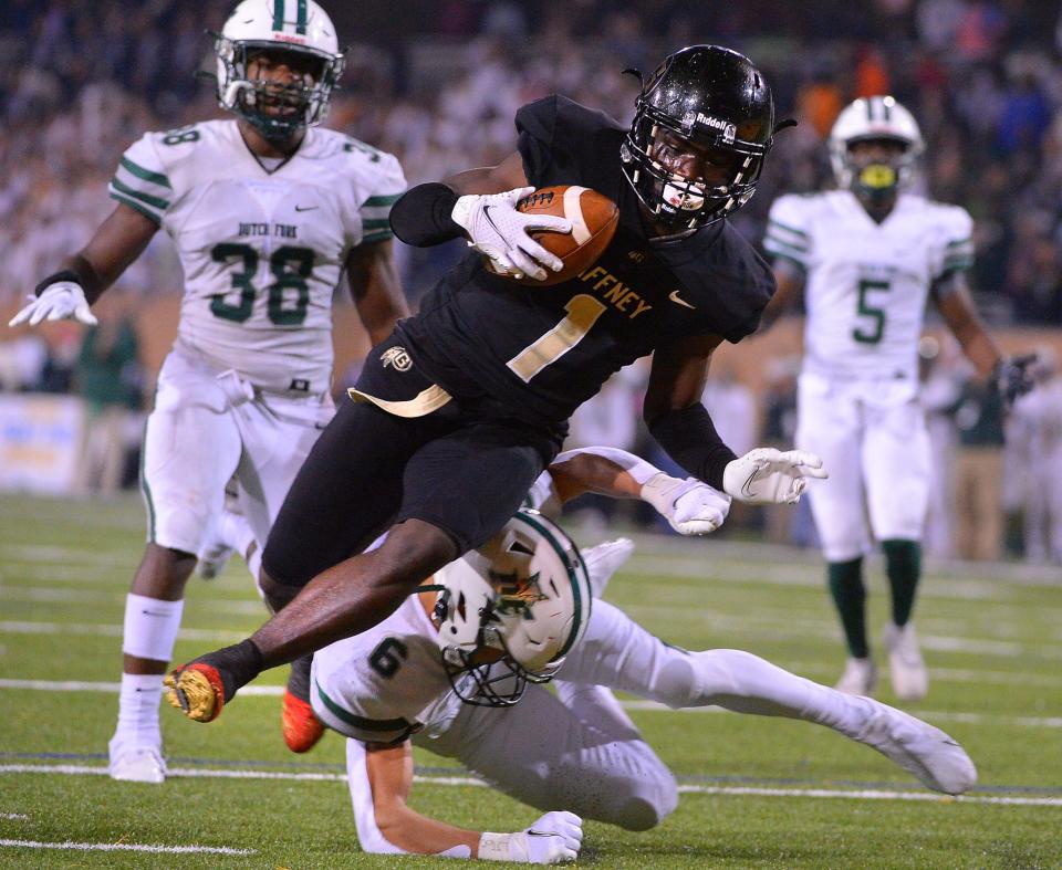 The Gaffney Indians take on the Dutch Fork Silver Foxes in the SCHSL AAAAA State Championship football game, held at Benedict College in Columbia, Saturday evening, December 4, 2021. Gaffney wide receiver Suga Jefferies (1) jumps into the end zone for a touchdown against Dutch Fork during the fourth quarter of action Saturday.