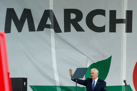 U.S. Vice President Mike Pence waves at the annual March for Life rally in Washington, DC, U.S. January 27, 2017. REUTERS/Yuri Gripas