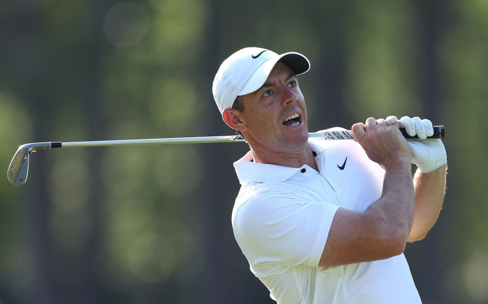 Rory McIlroy of Northern Ireland plays an approach shot from the 12th fairway during the second round of the 124th U.S. Open