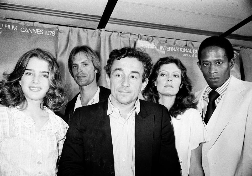 FILE - French director Louis Malle, center, is joined by actresses Brooke Shields, from left, Keith Carradine, Susan Sarandon and Antonio Fargas to present the U.S. entry "Pretty Baby" at the 31st Cannes International Film Festival in Cannes, France, on May 22, 1978. A new docuseries "Pretty Baby: Brooke Shields" premieres Monday on Hulu. (AP Photo, File)