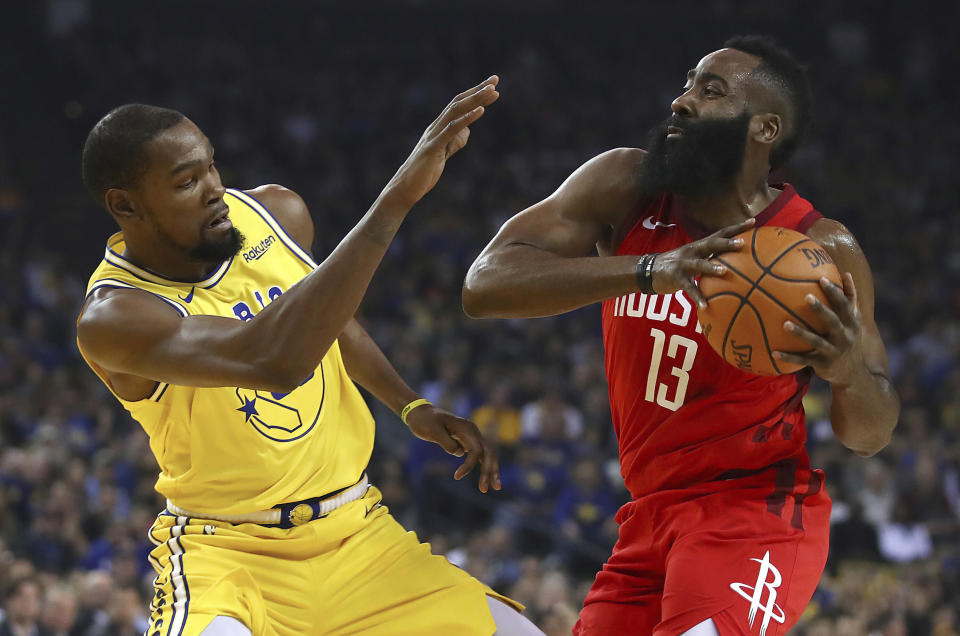 Kevin Durant doesn't have a problem with James Harden's style of basketball. (AP)