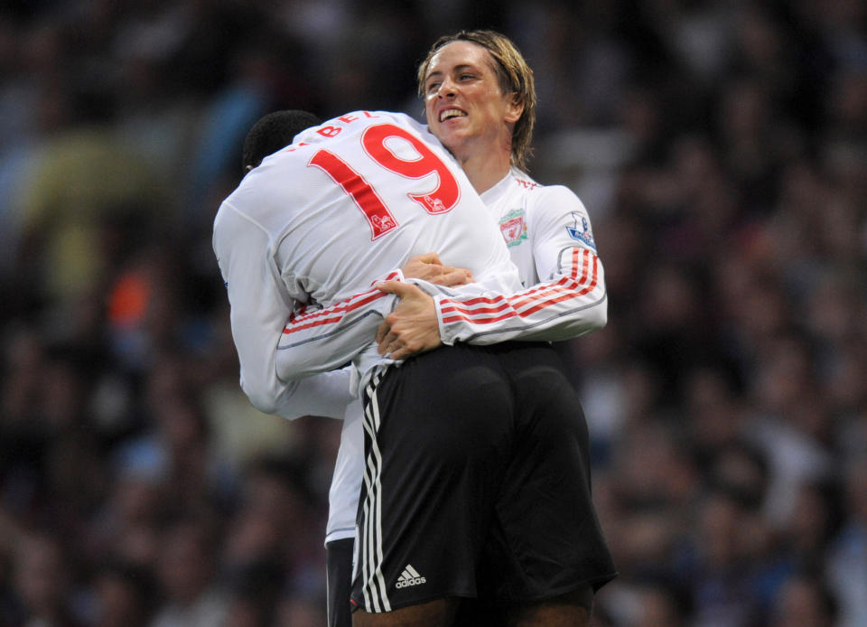 What a player: Fernando Torres gives Ryan Babel a hug