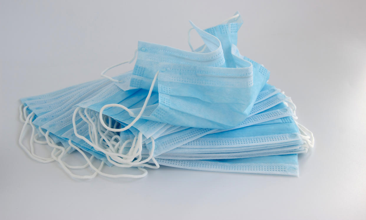 A stack of surgical masks.