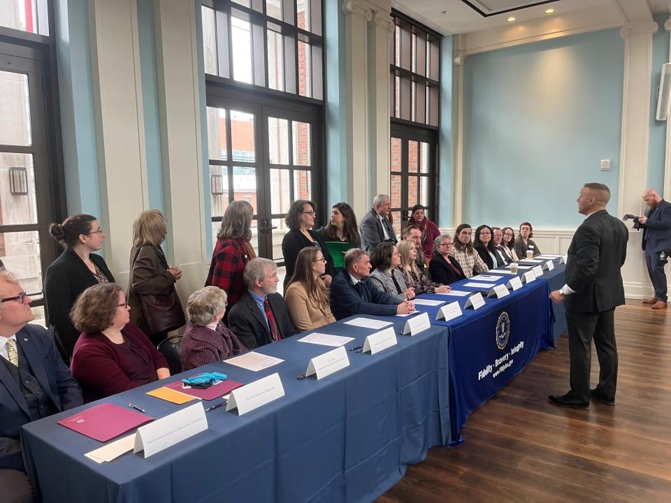 FBI Special Agent Jake Archer, Art Crimes, speaks to the representatives from 16 museums whose historic artifacts were returned  March 13, 2023, at a ceremony held at the Museum of the American Revolution.