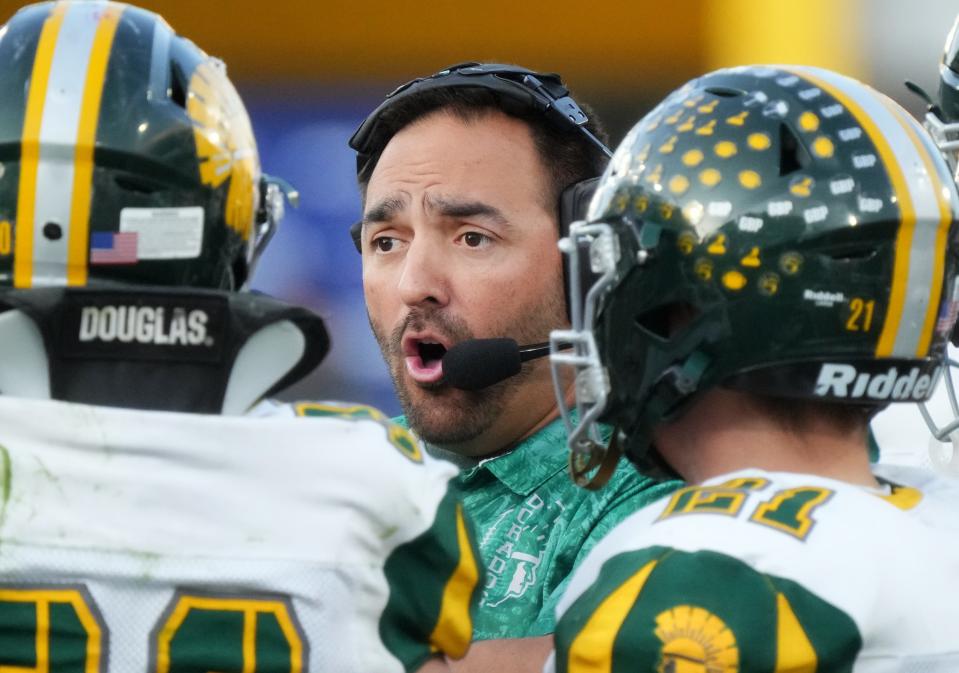 Canyon del Oro Dorados head coach Dustin Peace during their 4A State Championship game against the Yuma Catholic Shamrocks at Mountain America Stadium on Dec. 1, 2023, in Tempe.