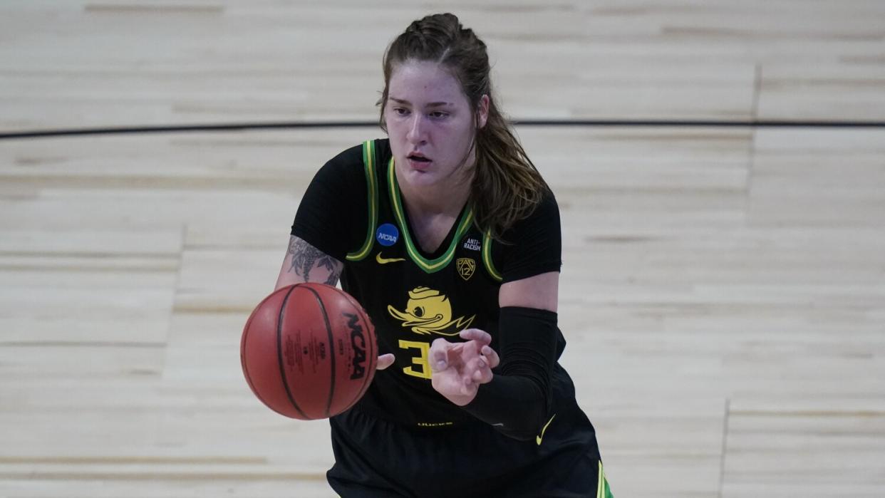 Oregon forward Sedona Prince passes during an NCAA tournament game against Georgia in March 2021.